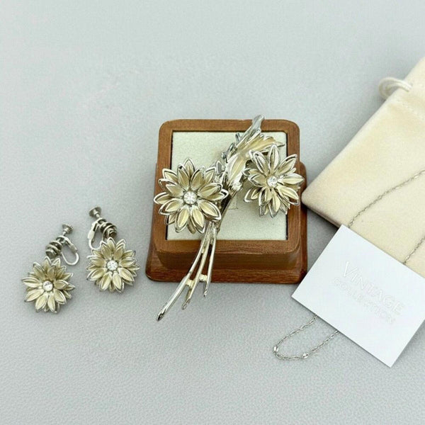 Vintage Elegance: Silver & Gold Tone Floral Brooch with Crystal Accents