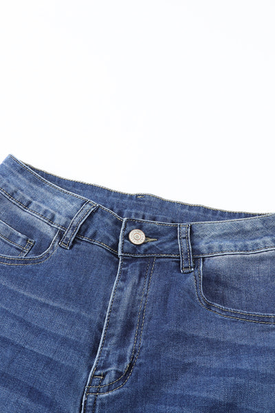 Mid Rise Distressed Flared Jeans